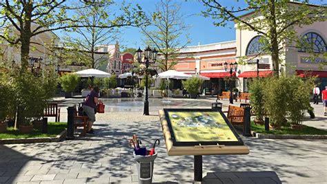 Save at the Neumünster Designer Outlet Mall near .